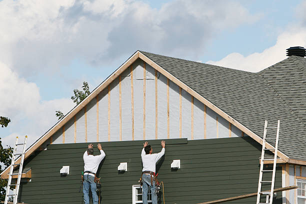 Professional Siding Contractor technician working in Falmouth, KY